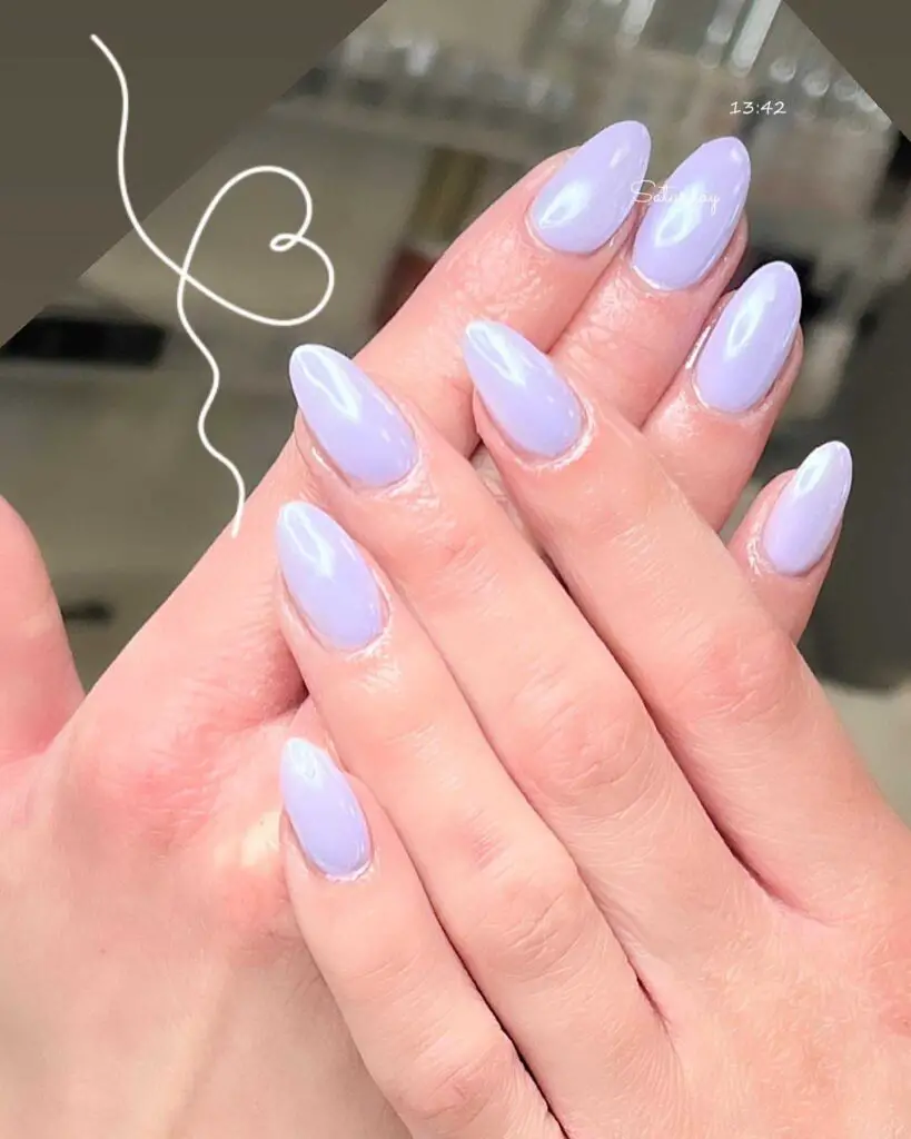 Pastel lavender nails offering a serene pop of color, perfect for a fresh springtime look.
