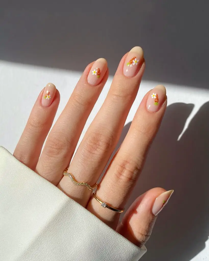 Miniature daisy designs on a sheer peach-toned nail base, presenting a charming and serene look ideal for springtime.