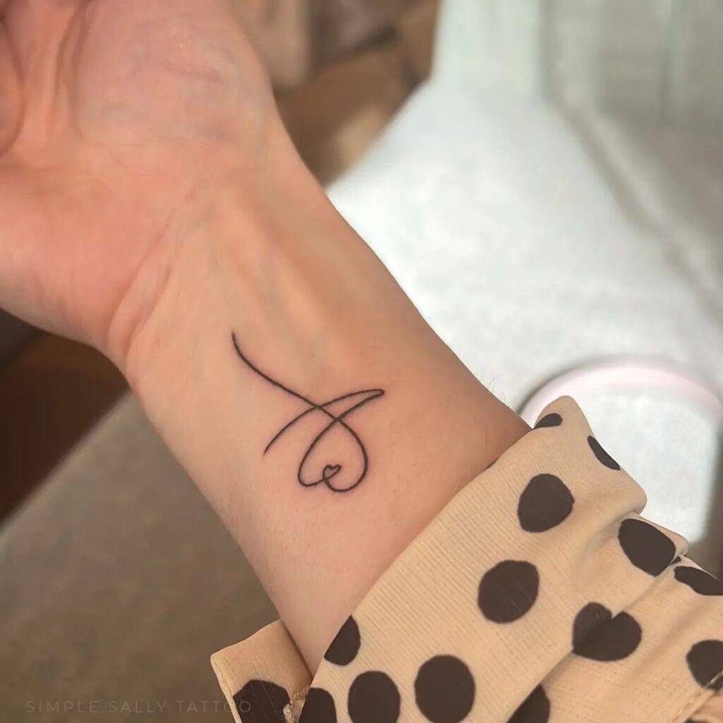 Whimsical Simplicity - Abstract Line Tattoo on Wrist