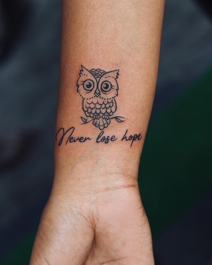 Wise Whispers: Owl Tattoo Symbolizing Knowledge