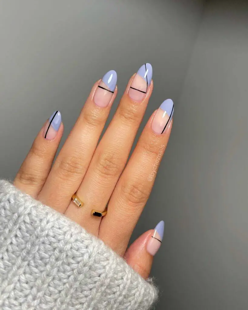 Hand with almond-shaped nails featuring a modern lavender line art on a nude base, exemplifying contemporary nail art elegance.