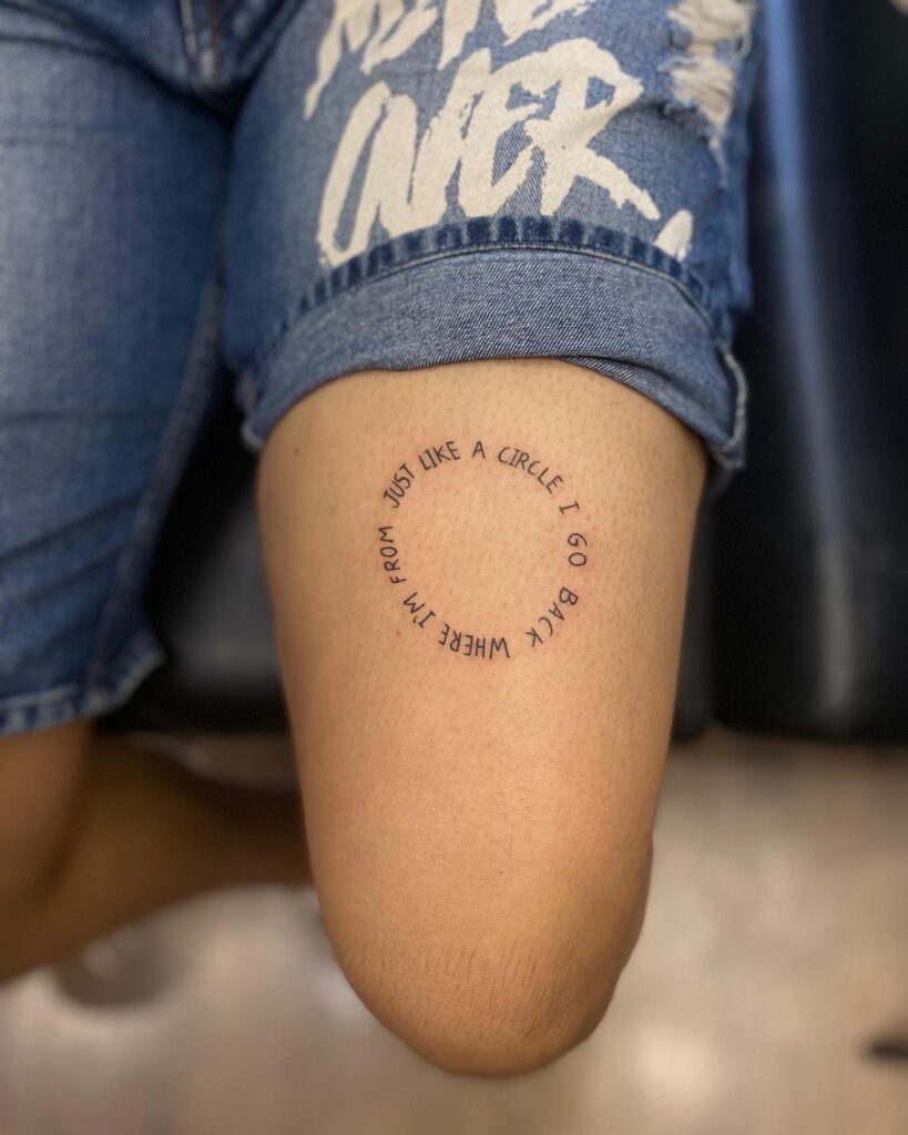 Infinite Echo: Circular Quote Tattoo