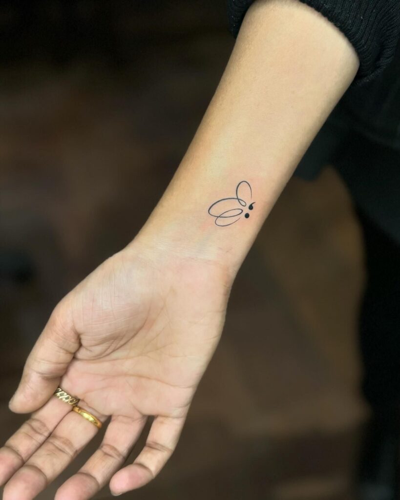 Bee Creative: Single Line Bee Tattoo