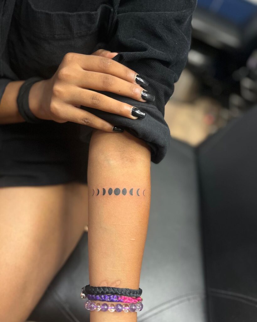 Phases of the Moon Forearm Tattoo