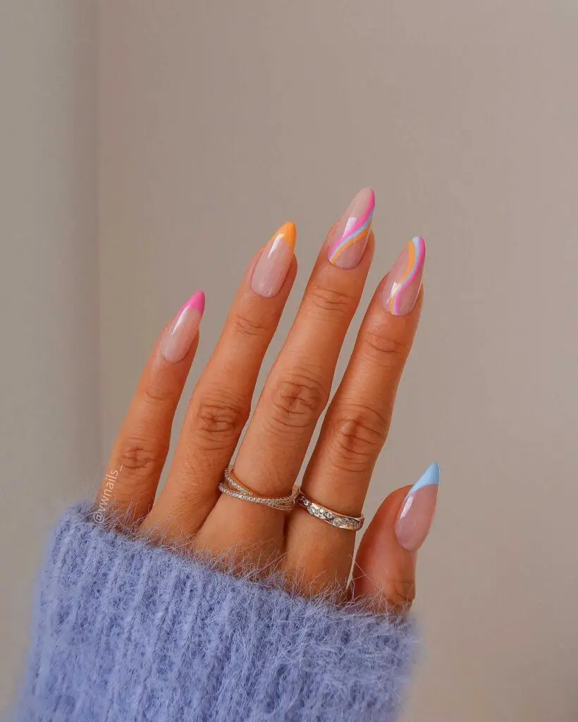 Almond-shaped nails featuring pastel-colored soft wave designs for a playful and creative look.
