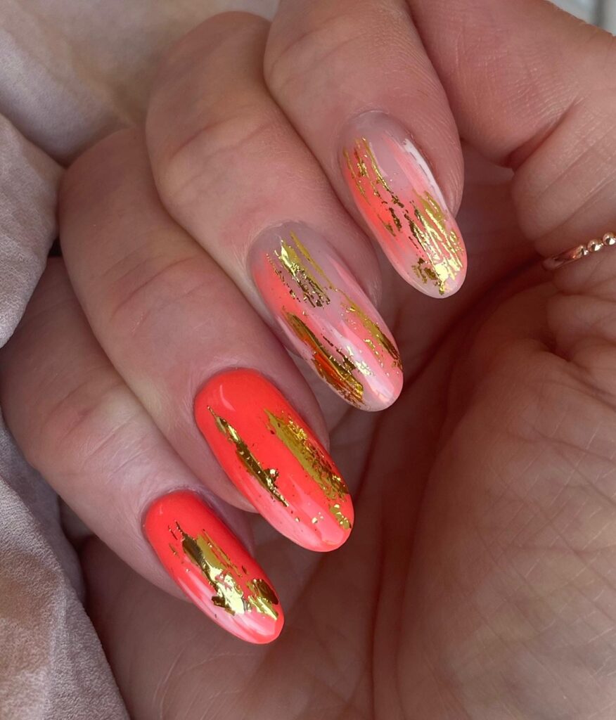 Coral Luxe: Almond Nails with Golden Foil Accents