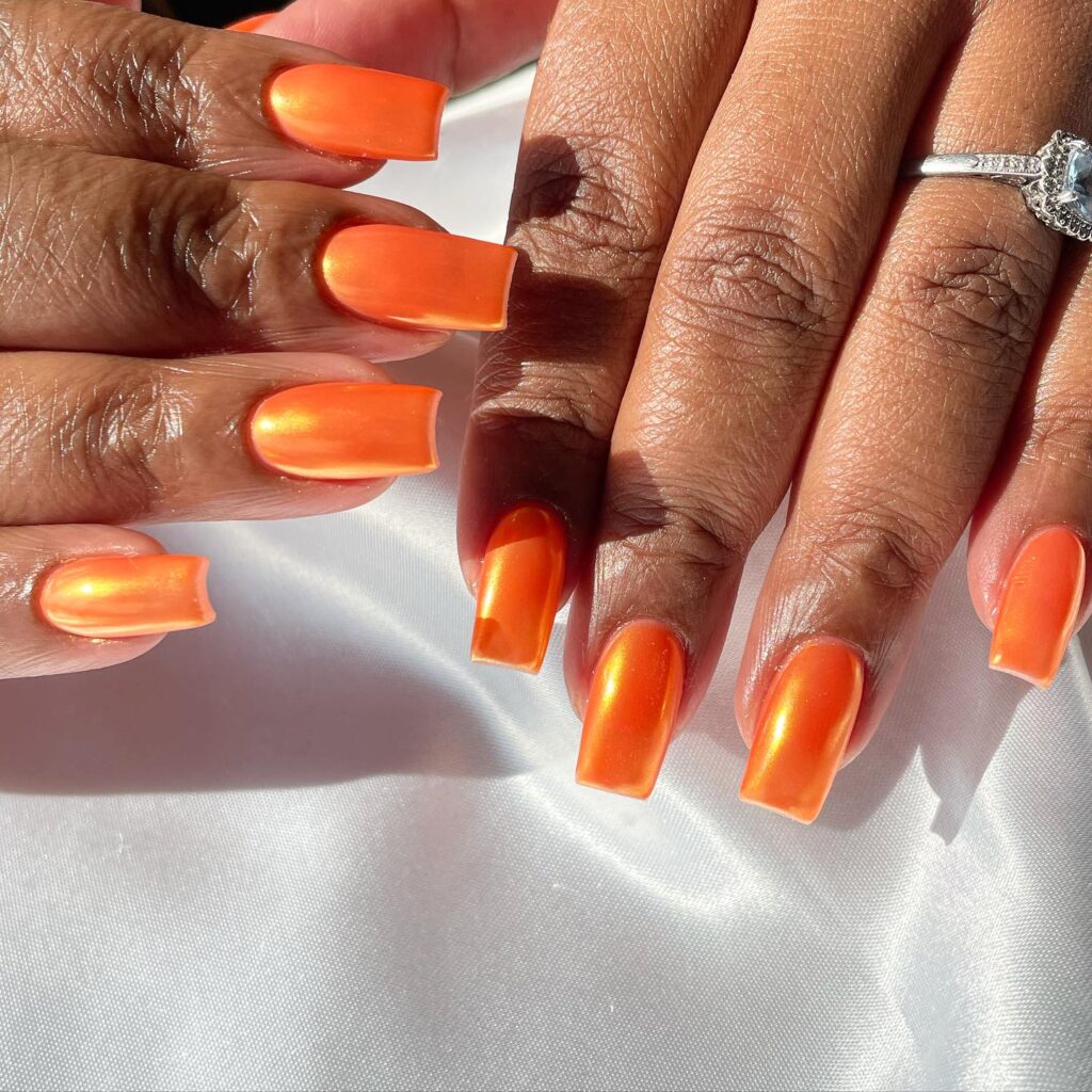 Luminous Lacquer: Bright Orange Square-Tipped Nails