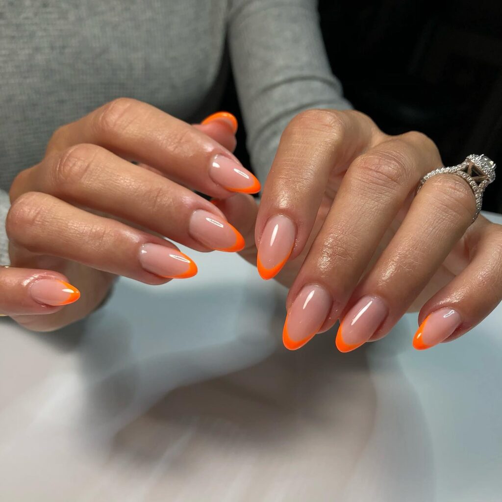 Neon Edge: Nude Nails with Orange Outline