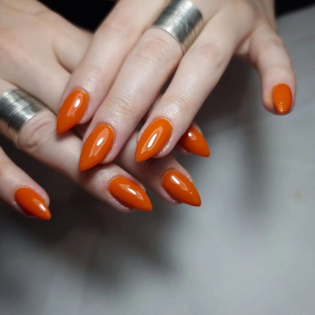 Simple and Striking: Glossy Orange Stilettos