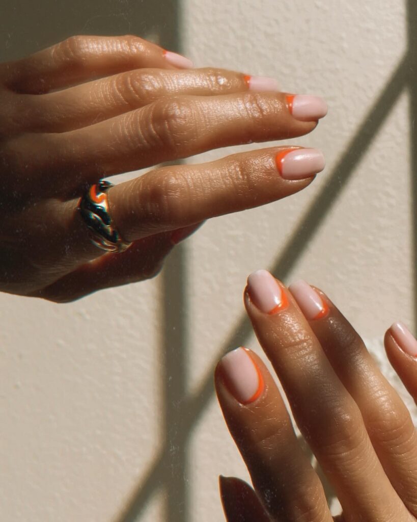 Sunlit Softness: Pale Peach Nails with Crisscross Shadows