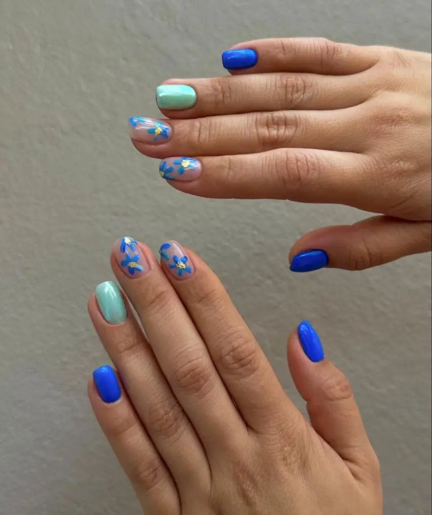 Blossoming Blues: Floral Accent Nail Inspiration